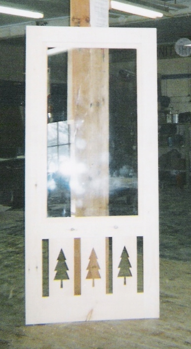 Decorative shop storm doors